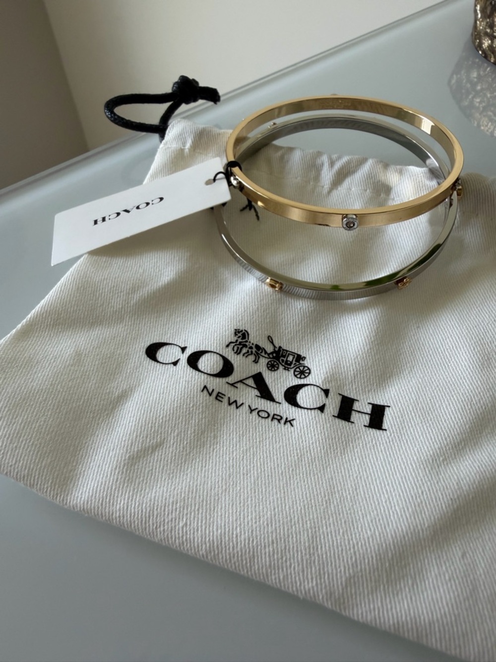 Coach gold and silver mini icon Bangle Set of two